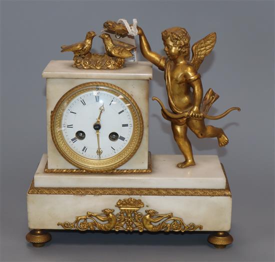 A 19th century French ormolu and white marble mantel clock, H.9in.